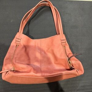 A.N.A a new approach pink in color purse.
See pictures of wear